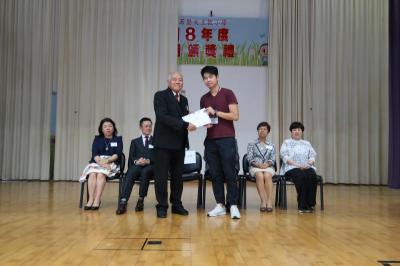 presentation of certificate of appreciation to volunteer nursing students of Caritas Institute of Higher Educations