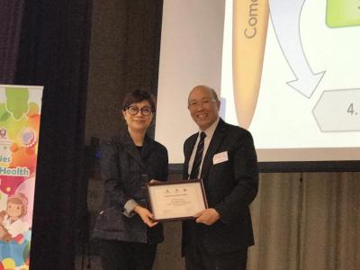 Presentation to1st speaker Dr Ada Yung by Prof. Godfrey Chan
